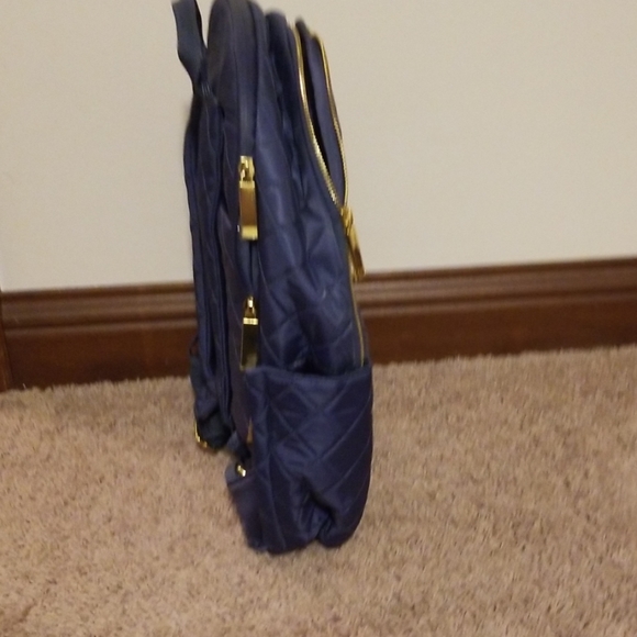 joy and iman quilted backpack